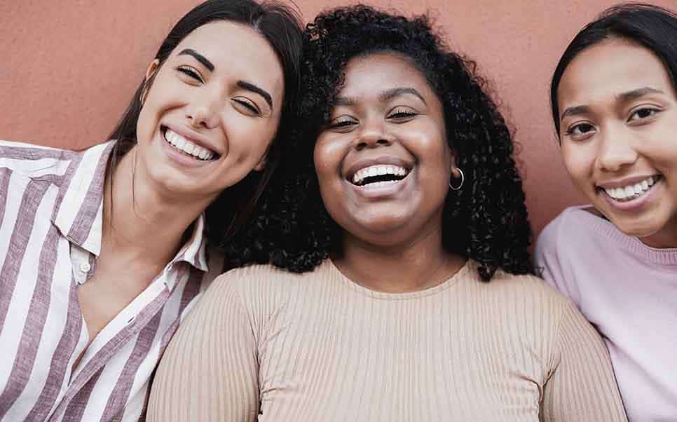 happy multiracial girls smiling on camera 2022 04 28 03 38 15 utc